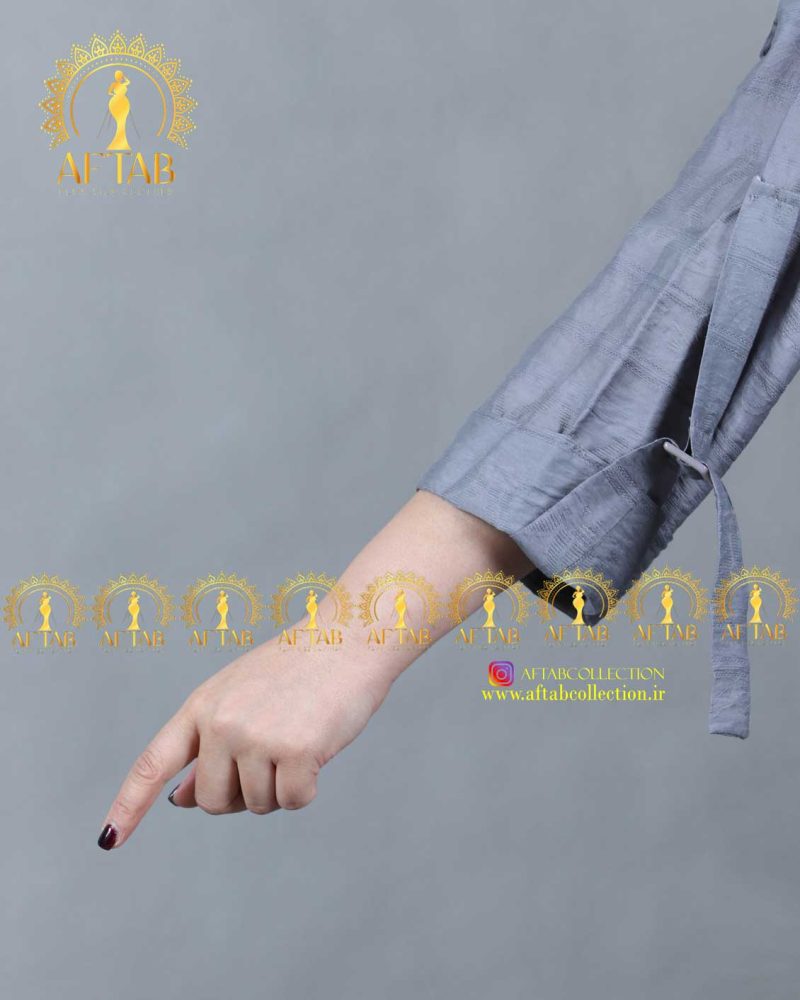 مانتو کتیبه سگک دار سایزبزرگ آستین کار مانتو کتیبه سگک دار سایزبزرگ آستین کار