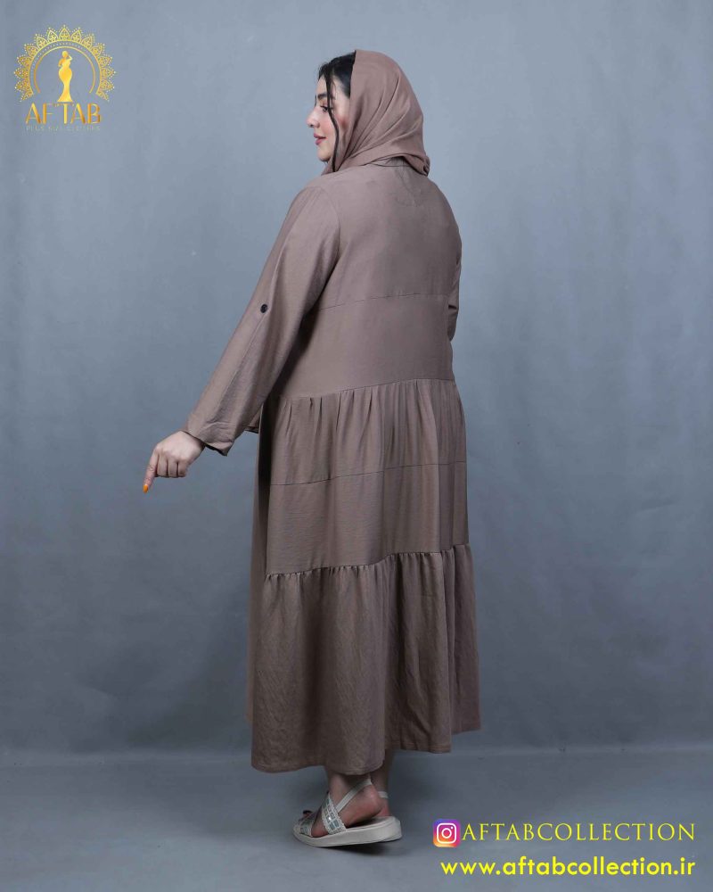 مانتو کرسپو بلند چیندار سایزبزرگ نما پشت مانتو کرسپو بلند چیندار سایزبزرگ نما پشت